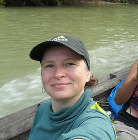 AWE team member Amanda Korstjens in boat in Indonesian river.