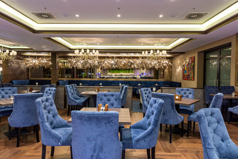 Modernaus ir klasikinio interjero restoranas