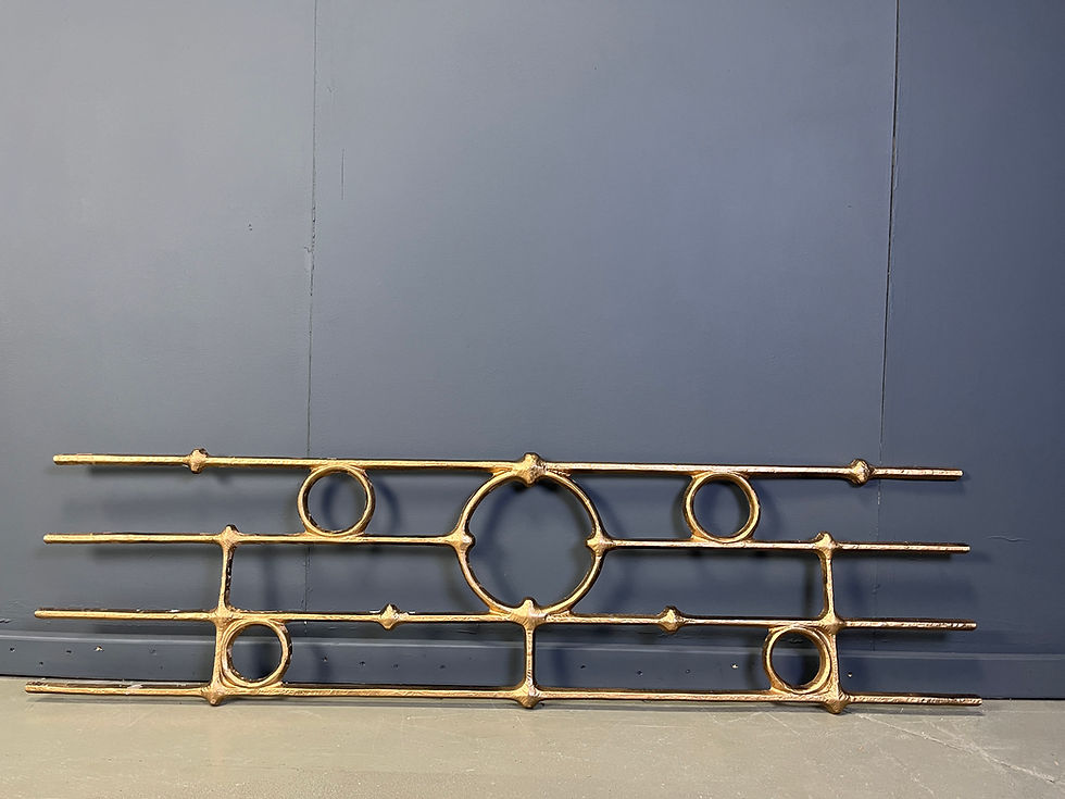 Thumbnail: Architectural brutalist wall mounted sculpture made from cast metal.