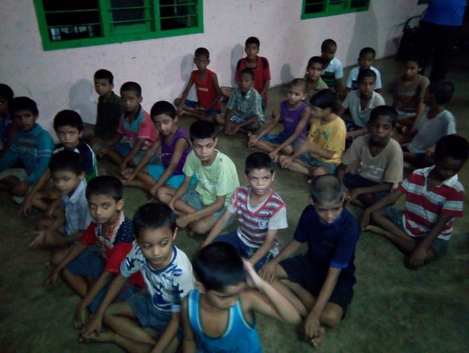 Group of children sitting on floor. Focus and meditation training.