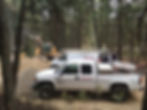tracer electric inc. trucks at construction site