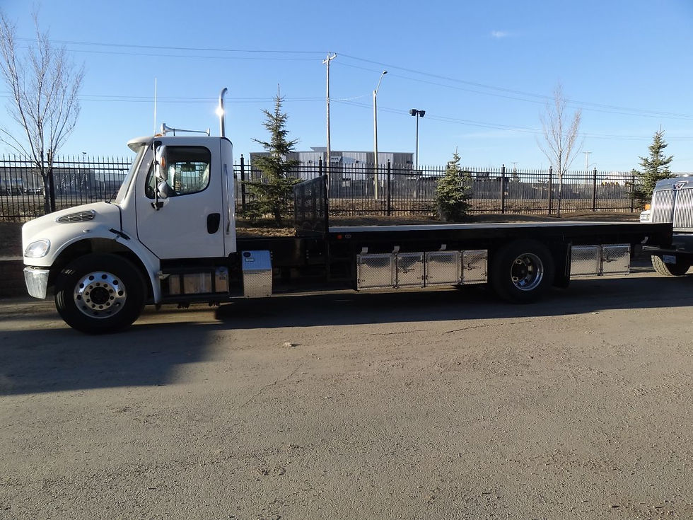 Flat bed truck with picker deck