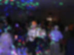 people enjoying the music with lights