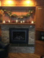 A fireplace built in a wooden house