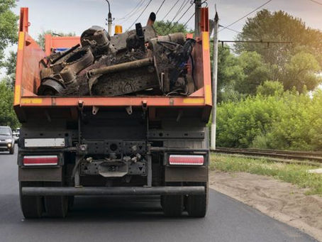 Heavy truck carrying an industrial load on the road