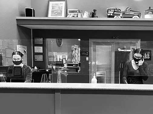 Madi and Lani working on reception area