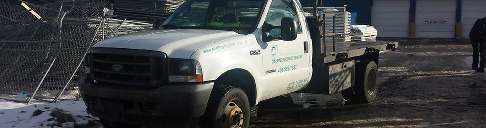 On-Site Security Truck with Fence Pieces on back