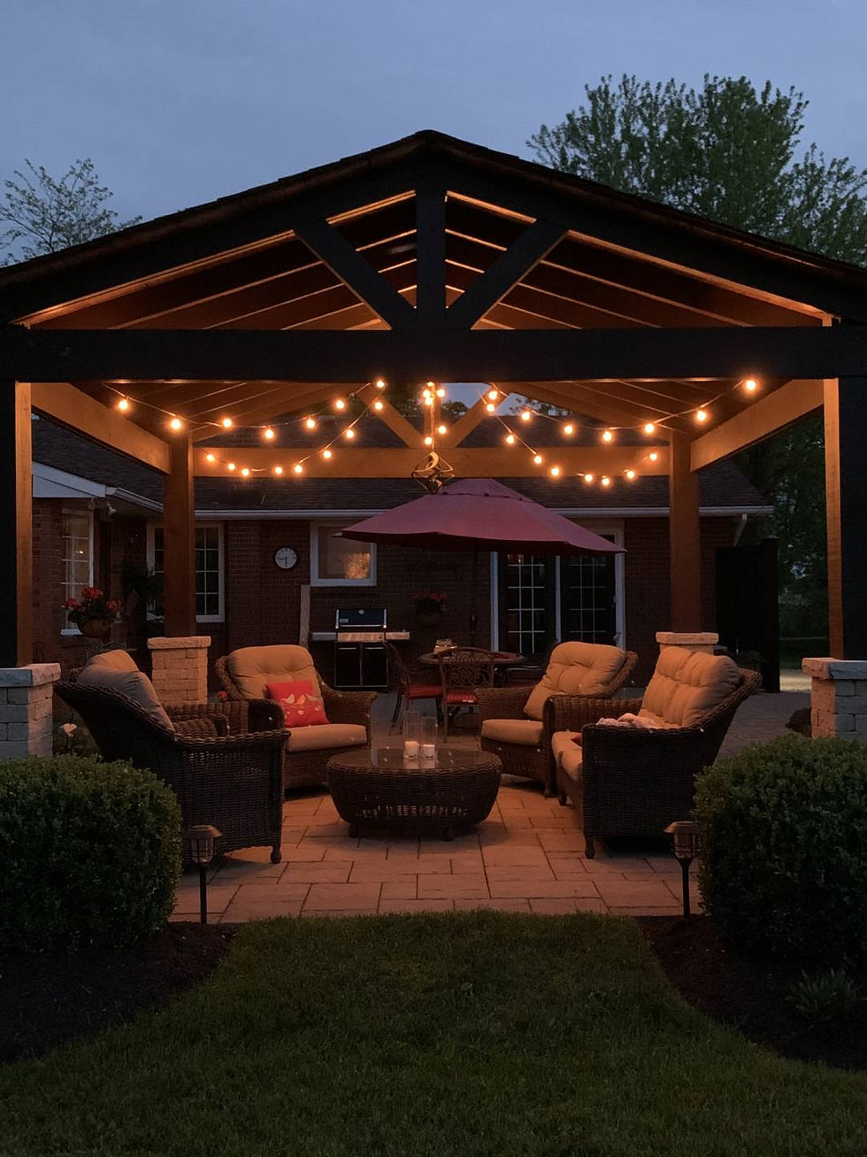 View of a covered outdoor seating area with lights