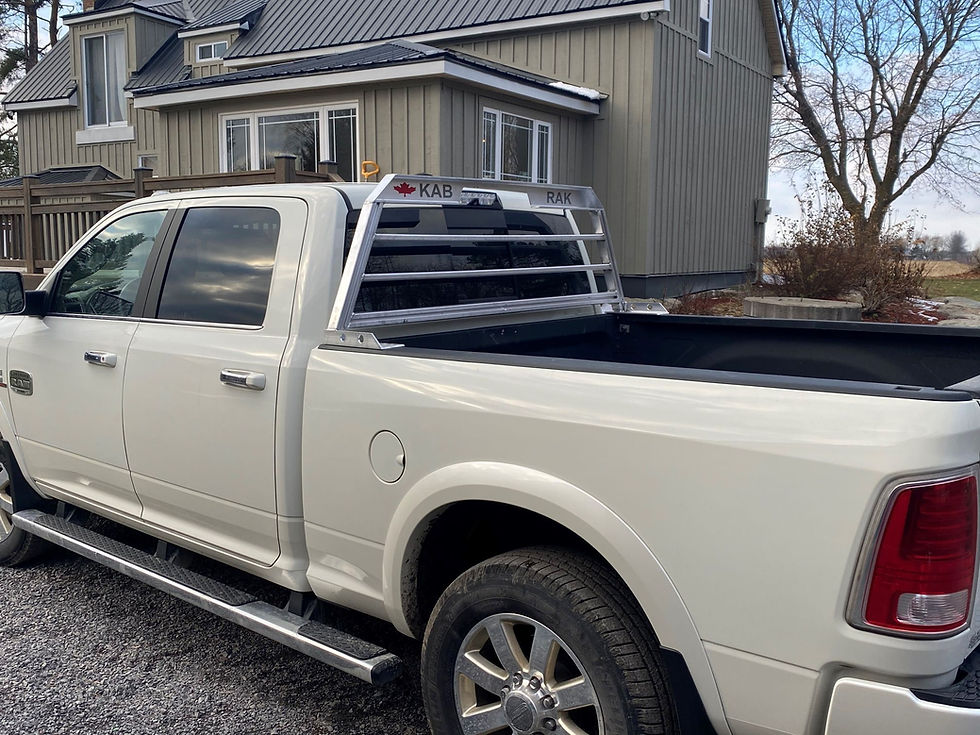 back view of white truck with custom rack