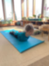 Kid doing excersize in school