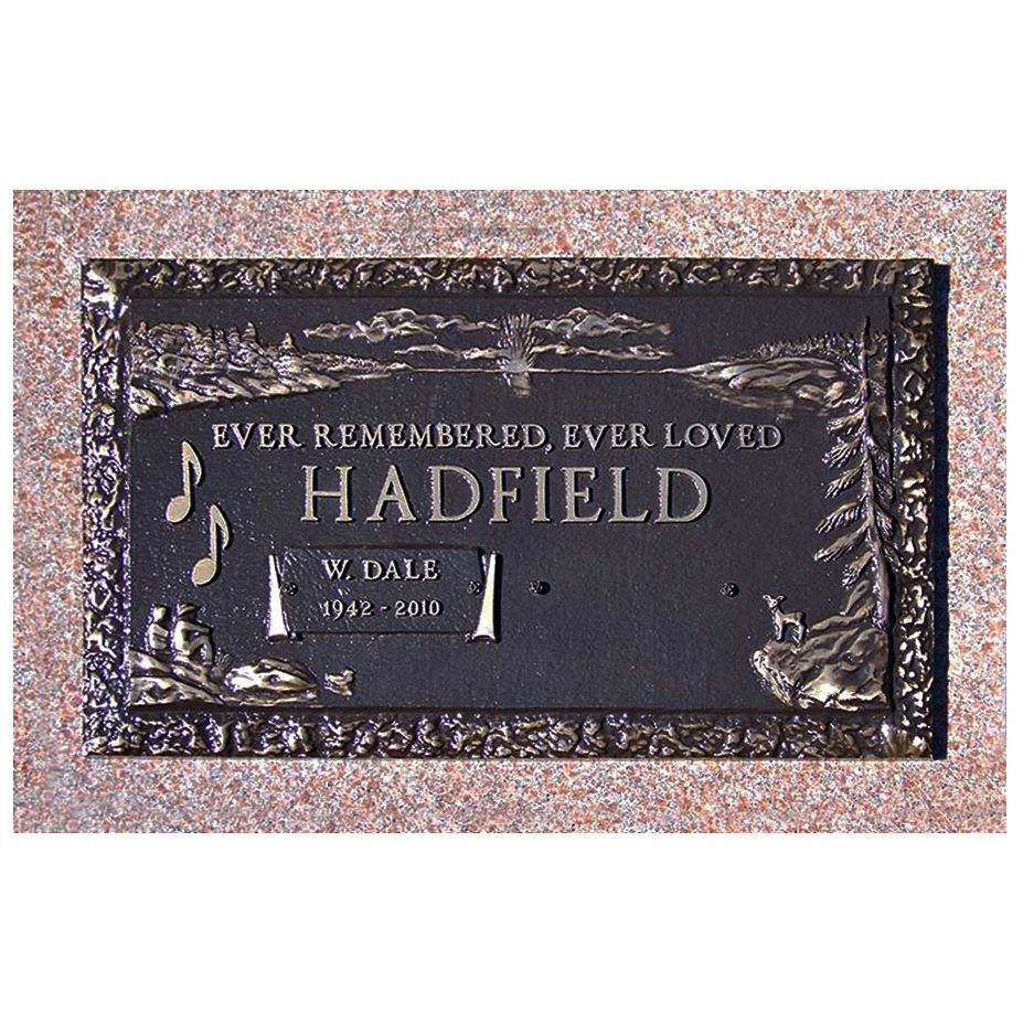 bronze grave marker music notes lake scenery fishing