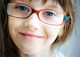 little girl with glasses