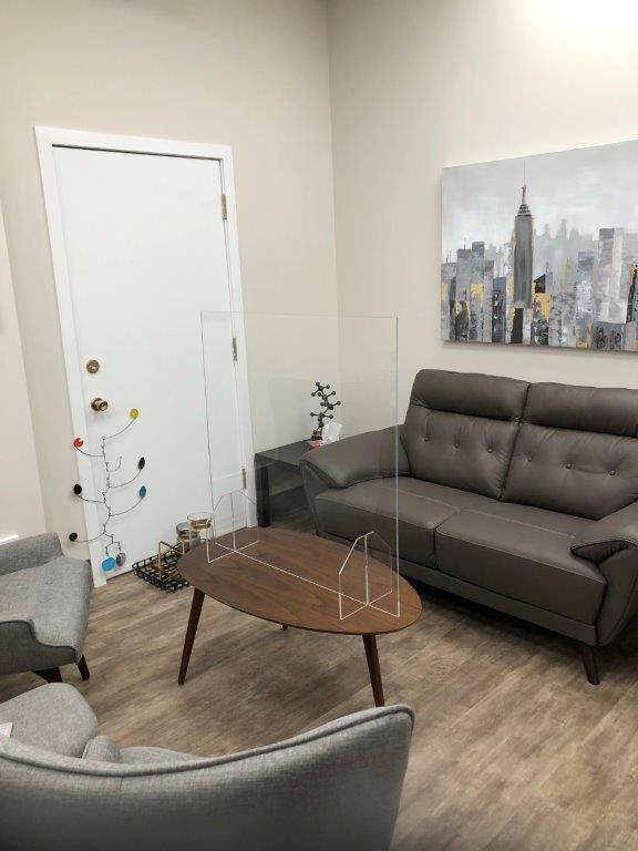 Acrylic glass installed between tables