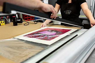 view of shrink wrapping a frame