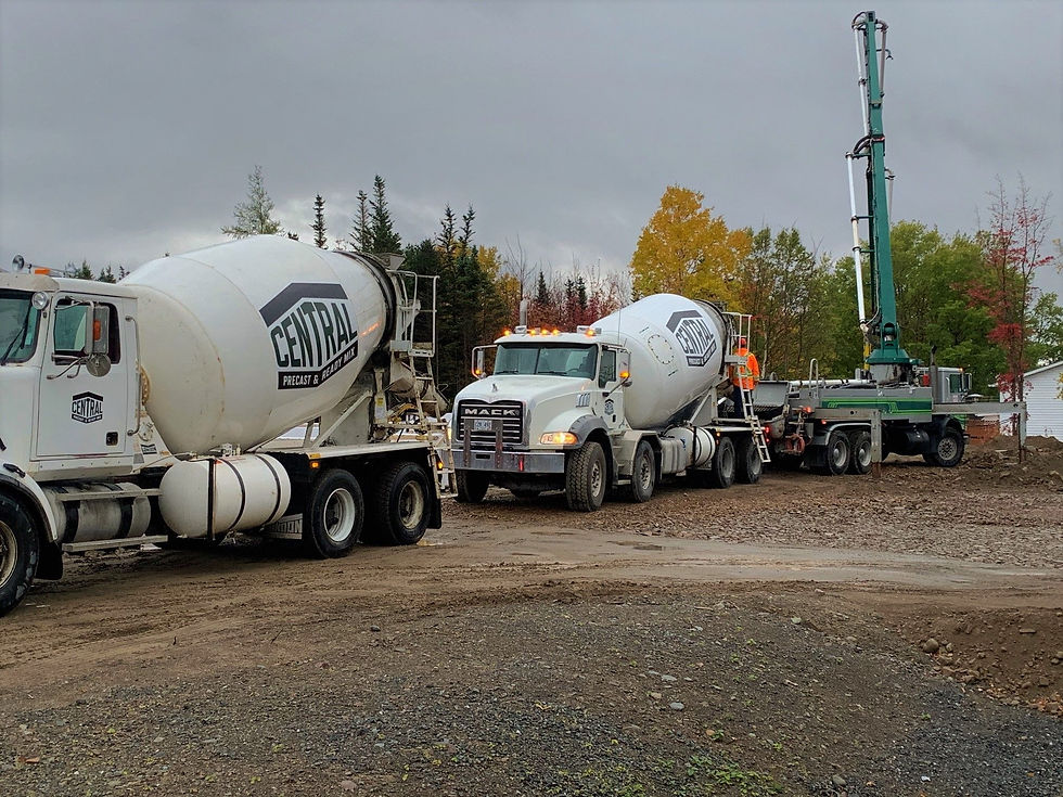 view of ready mix concrete trucks