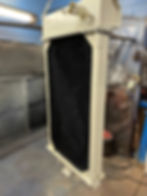 A large radiator hanging from the ceiling 