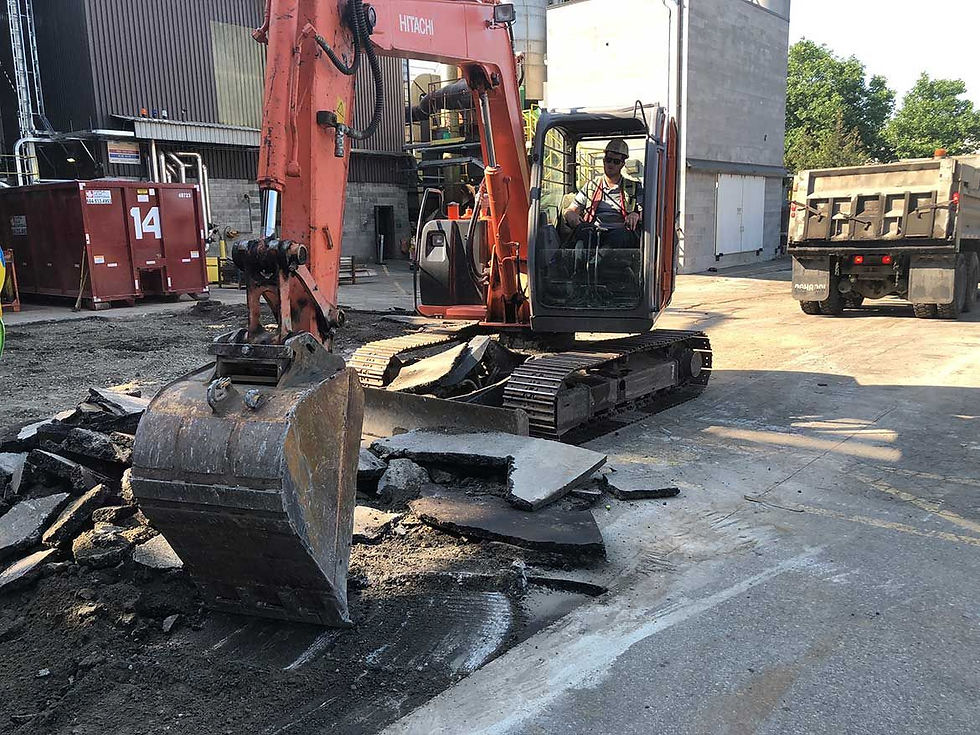 view of excavator working on a project site