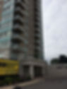 Bottom view of condo with company truck outside