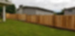 wooden fence on a slope