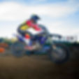 man jumping with a bike