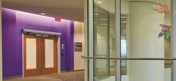Surface mounted automatic swing door operator
