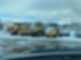 view of machines covered in snow
