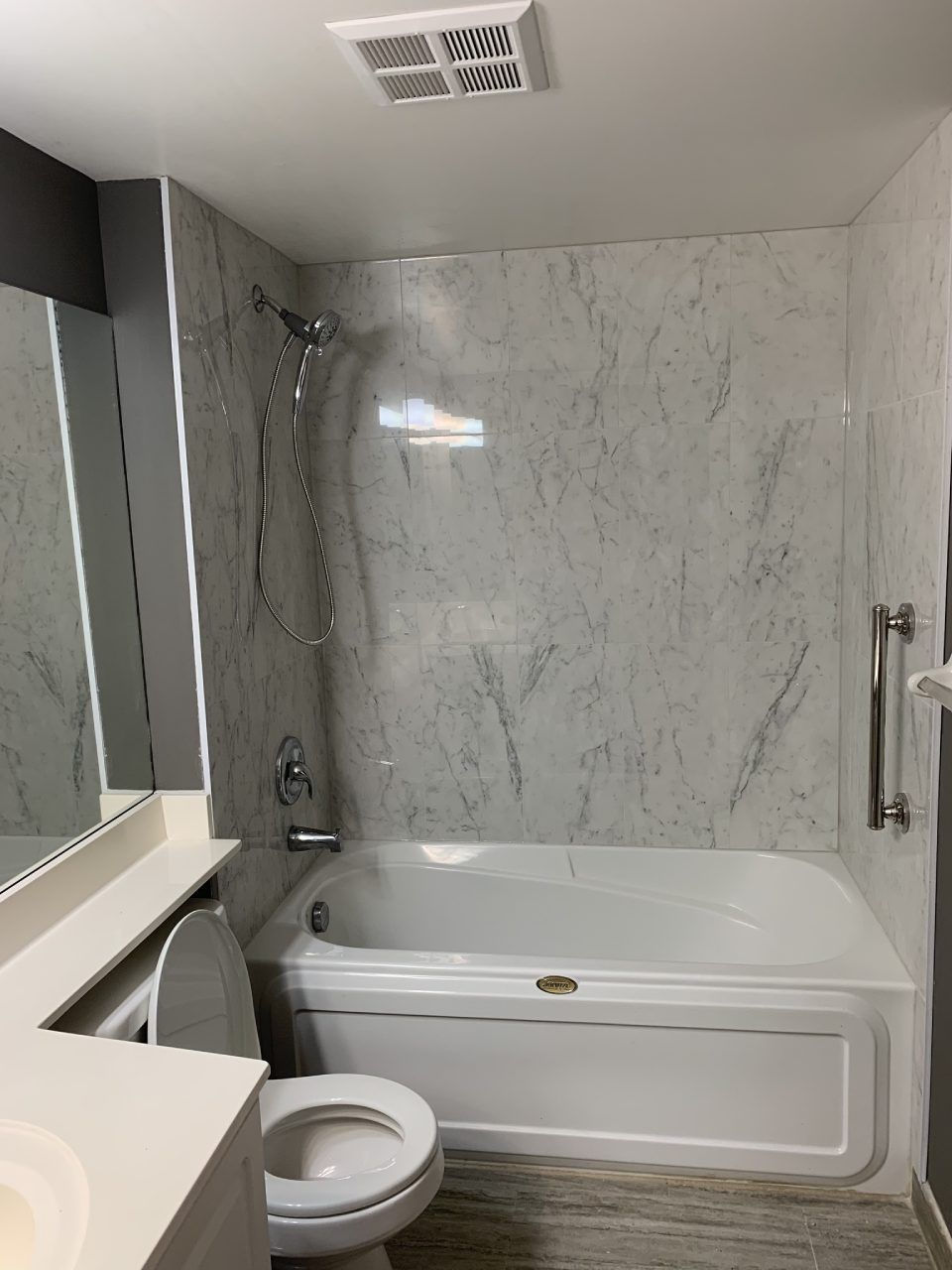 toilet with a bathtub