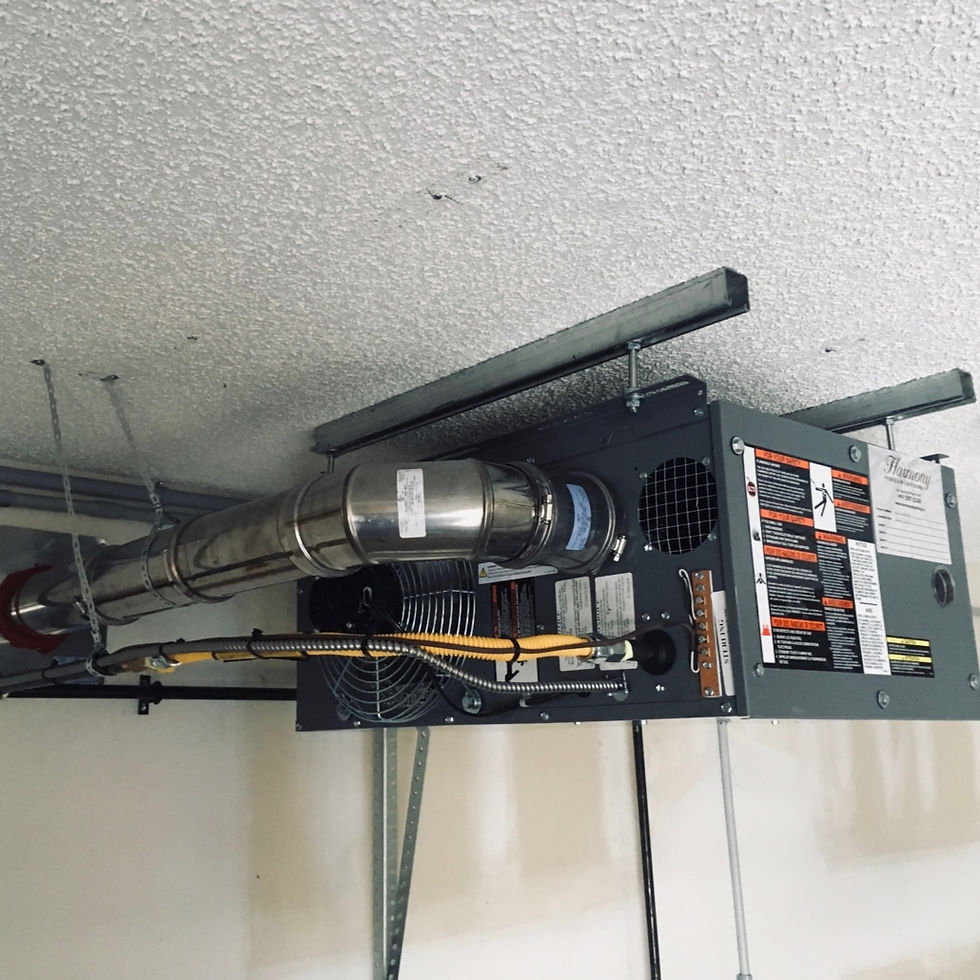 view of ducting system for garage unit heater