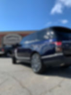 side view of a range rover outside the moffatt autoworks