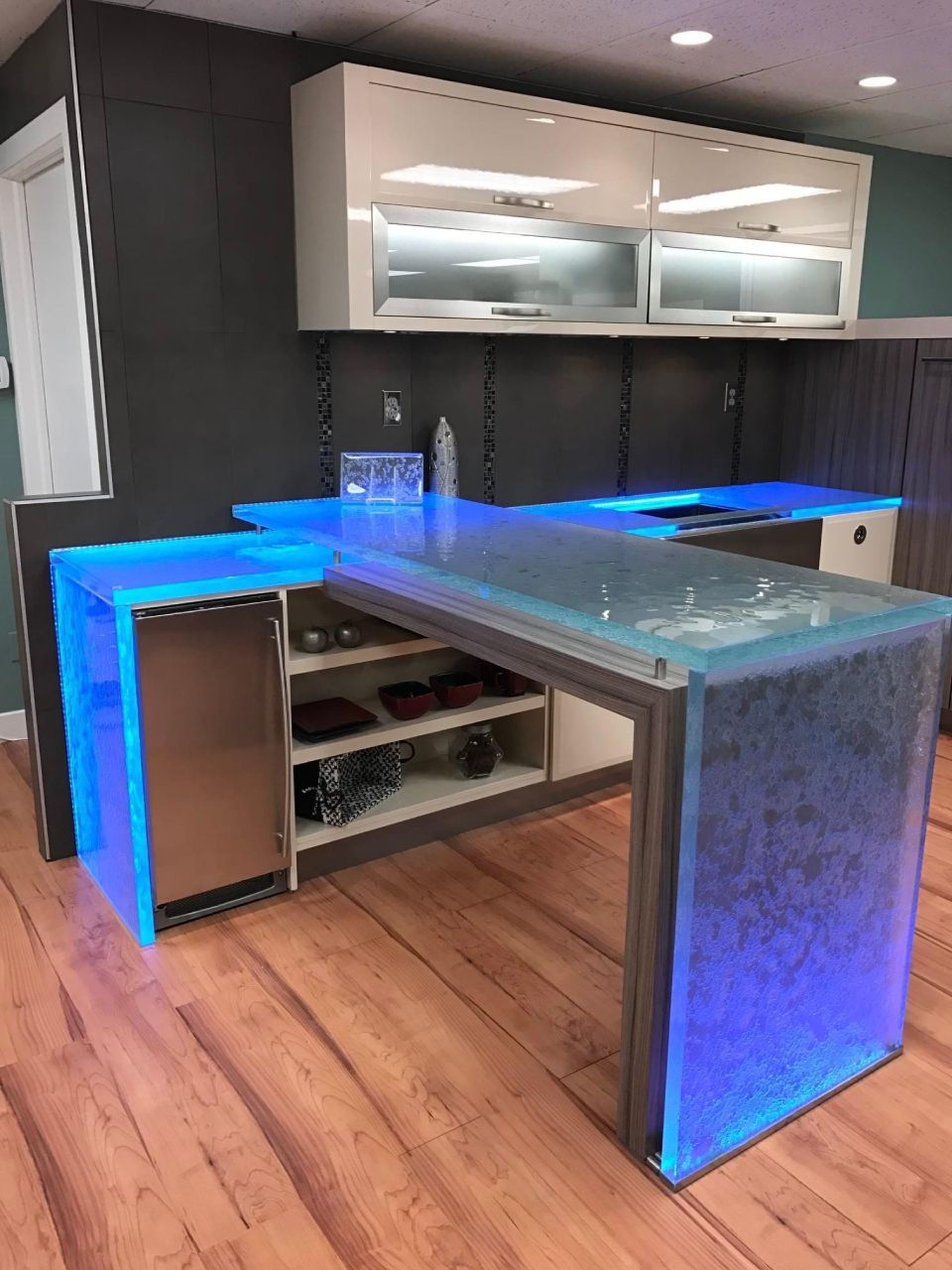 A kitchen countertop made of glass