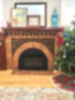 A fireplace and some painting above it