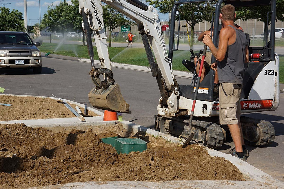 excavator at a landscaping site