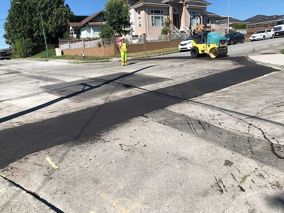 woman looking on mini road roller