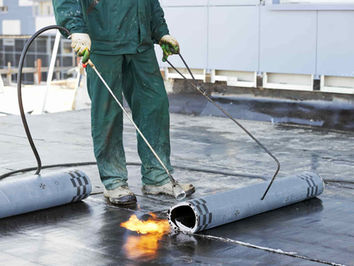 HOW ARE FLAT ROOFS WATERPROOFED?
