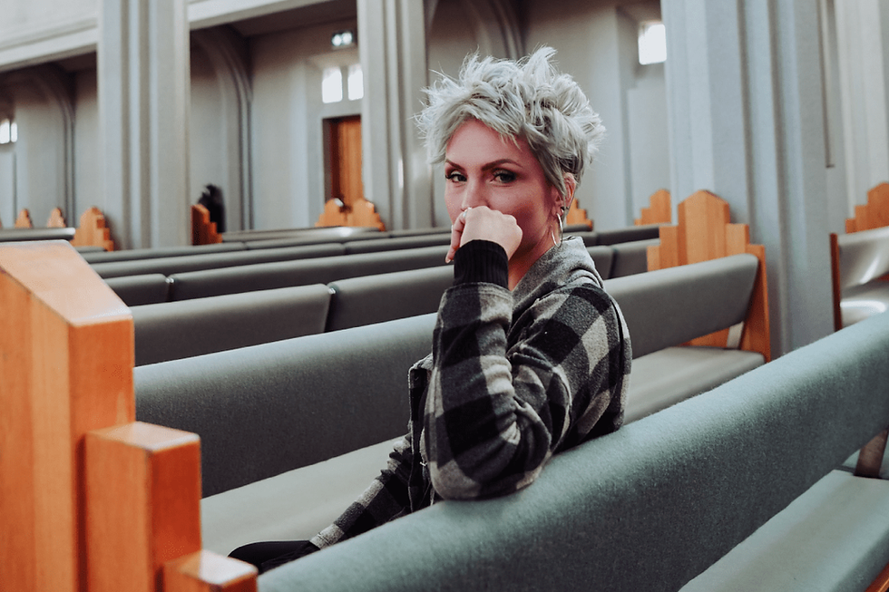 a woman looks sad in a court case of sexual harassment from ex husband