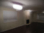 empty living room with a fireplace