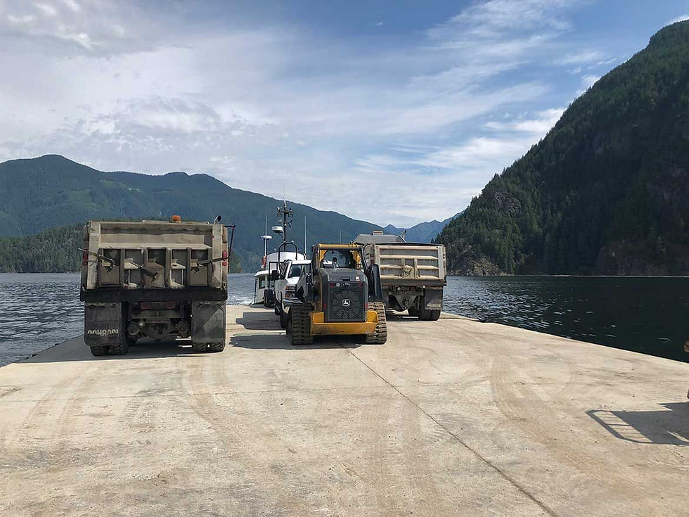 road roller and truck on the road