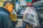 mechanic with headlight