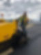 man on a road roller