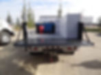 Rear view of Customized white truck with welding deck