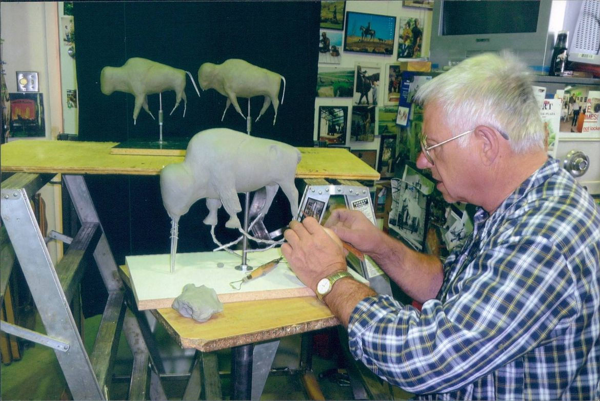 man working in a bronze workshop