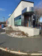 side view of a building with concrete floors