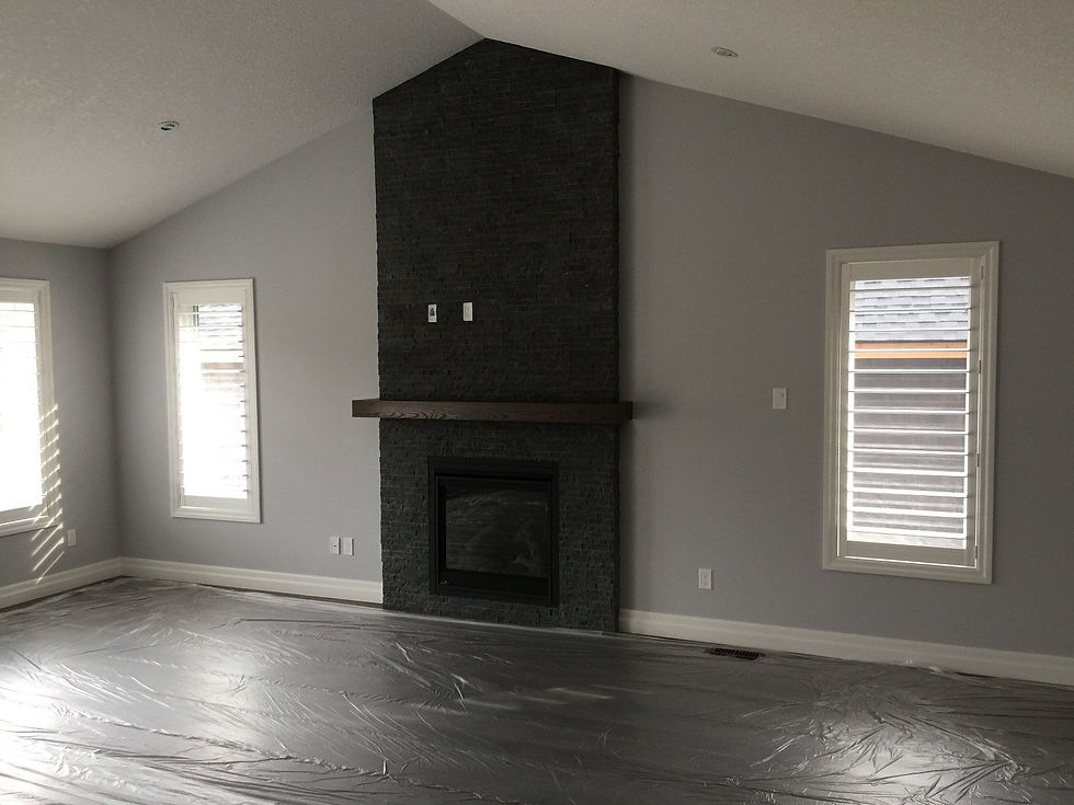 Two narrow windows on either side of a fireplace using window shutters