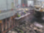 3 workers doing concrete repairs