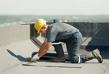 Worker Installing Roofing