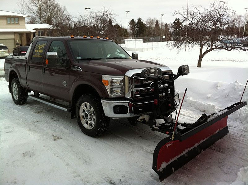 Company truck with snow plow