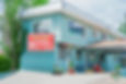 front view of motel with sign
