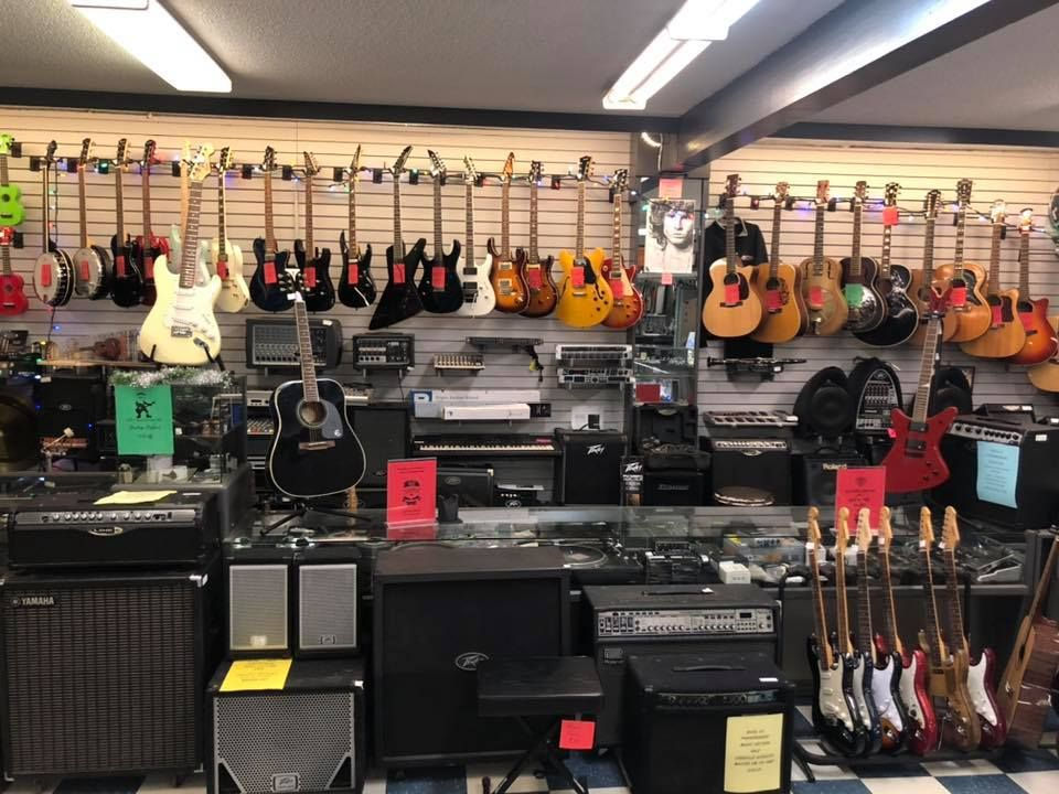 guitars on display in a shop