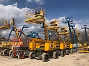 A large fleet of lift trucks