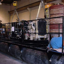 Diesel hydraulic power pack installed on frame.